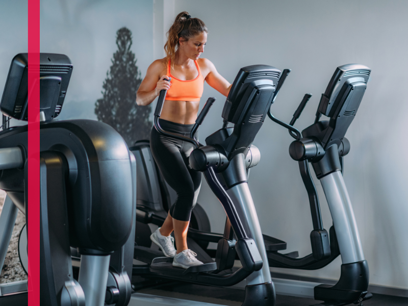 woman working out on elliptical