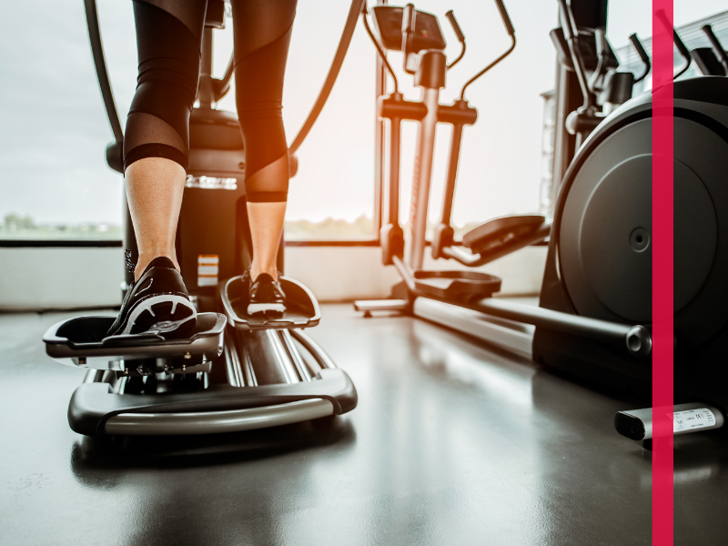 woman working out on elliptical